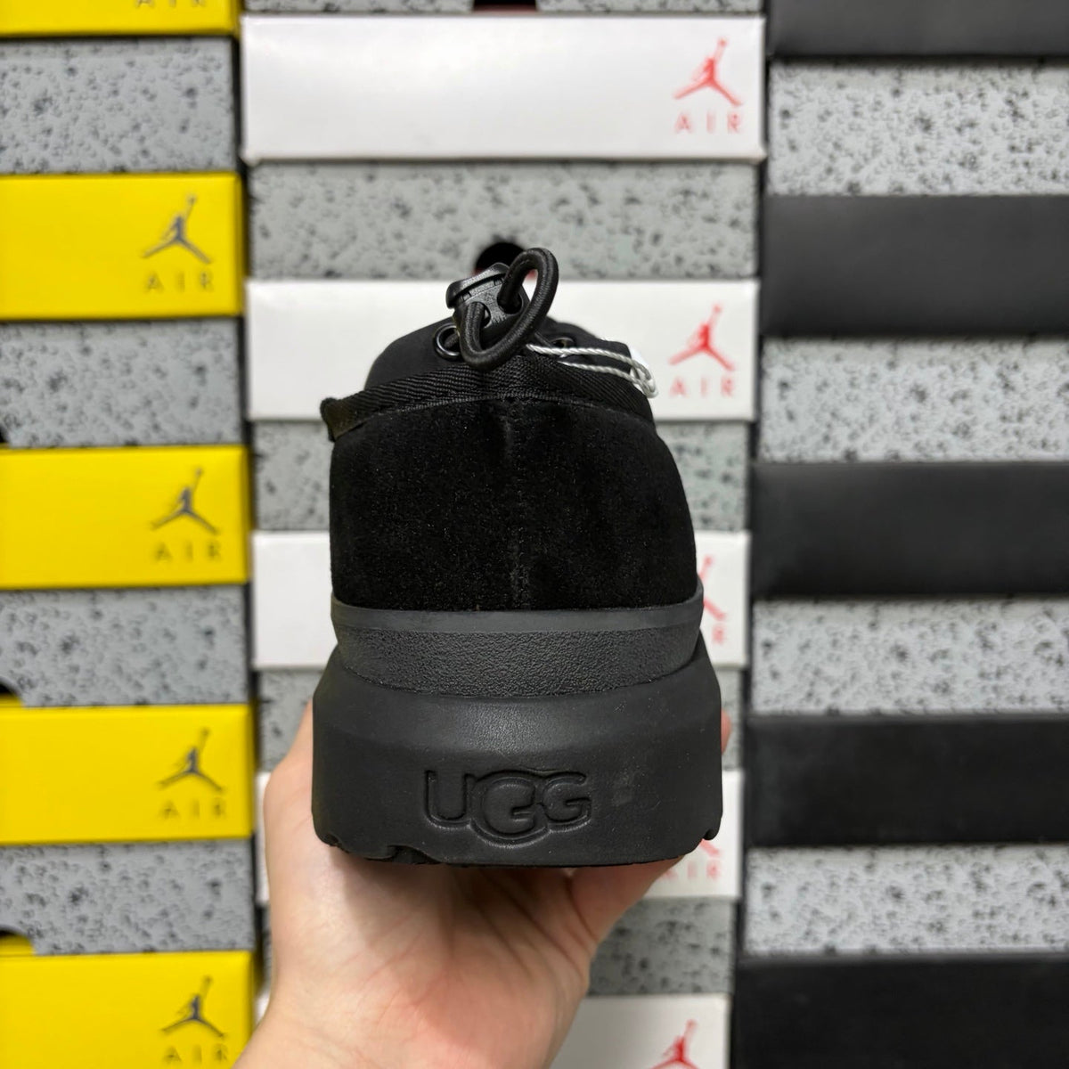UGG Neumeel Deco Slip-On – Suede Moccasin Sneaker in All Black with Carabiner Collar & Black Lug Sole